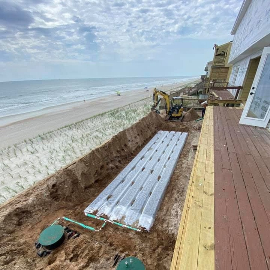 A new chamber drain field going in beside an oceanfront home